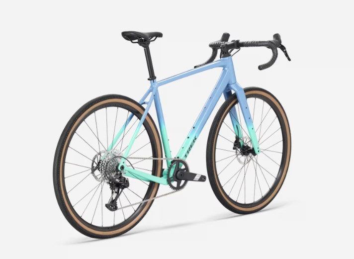 Angled profile view of a light blue and teal green Trek Checkpoint ALR 5 road bicycle on a white background