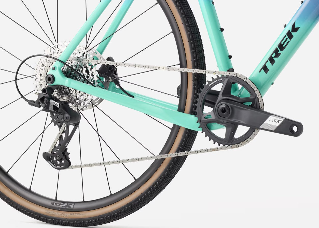 Close-up of a light blue fade to teal green Trek Checkpoint ALR 5 with visible black Trek branding on a white background