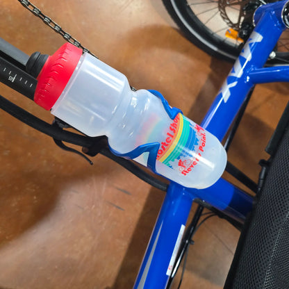 Top view of the Trek Elite Recycled Water Bottle Cage in Alpine Blue on a blue Catrike Max recumbent trike with a Hostel Shoppe water bottle in the cage.