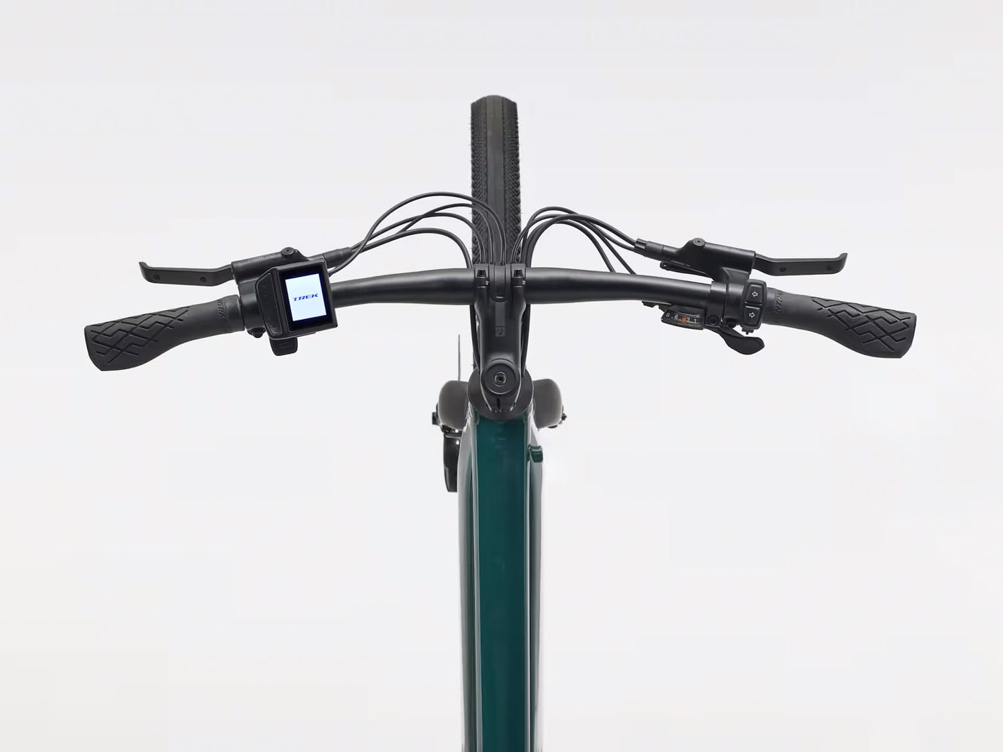 Top cockpit view of the Trek FX+ 1 Juniper e-Bike, shown on a white background.