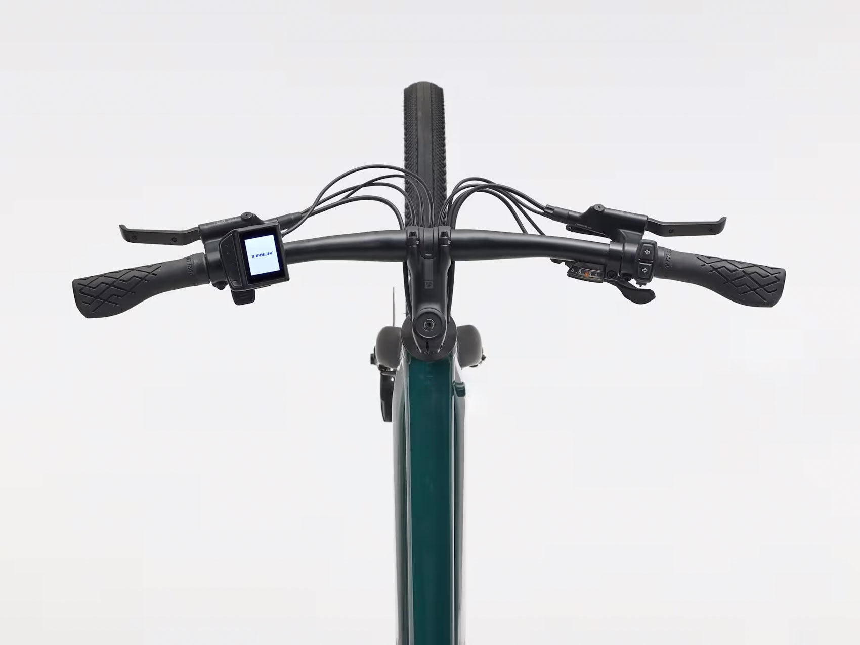 Top cockpit view of the Trek FX+ 1 Juniper e-Bike, shown on a white background.