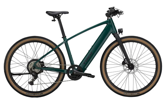 Side view of the Trek FX+ 1 Juniper e-Bike, shown on a white background.