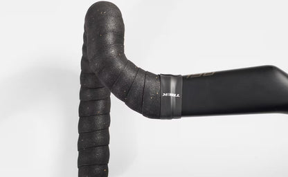 Close-up of a black Trek gel cork bicycle handlebar tape with 'Trek' branding on a white background.