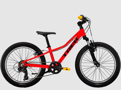 Side view of the Trek Precaliber 7 kids bike in red against a grey background.