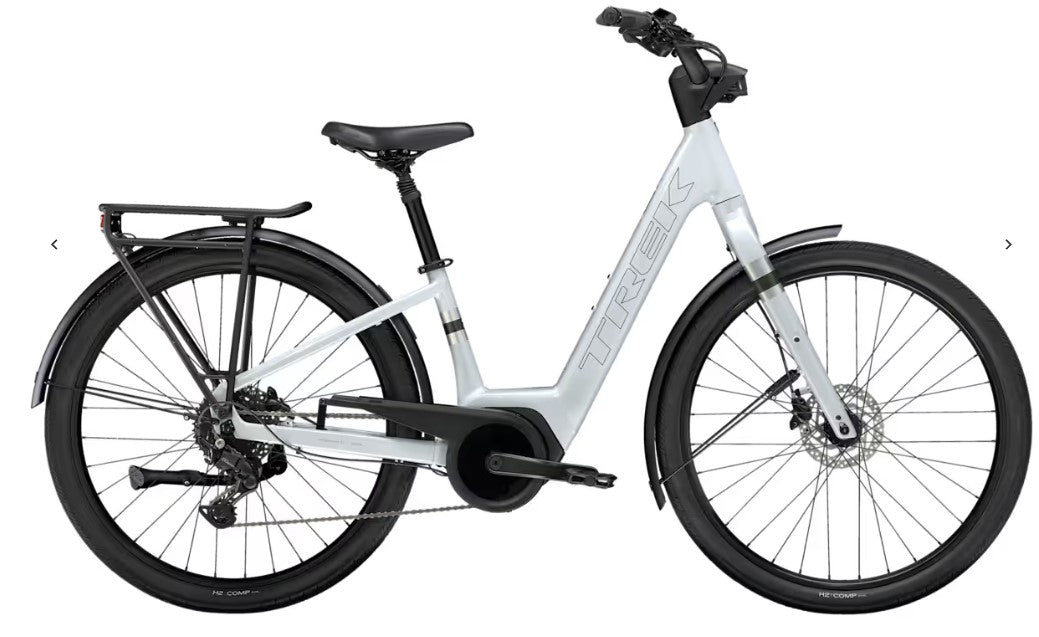 White Trek Verve Plus electric bicycle with black components on a white background