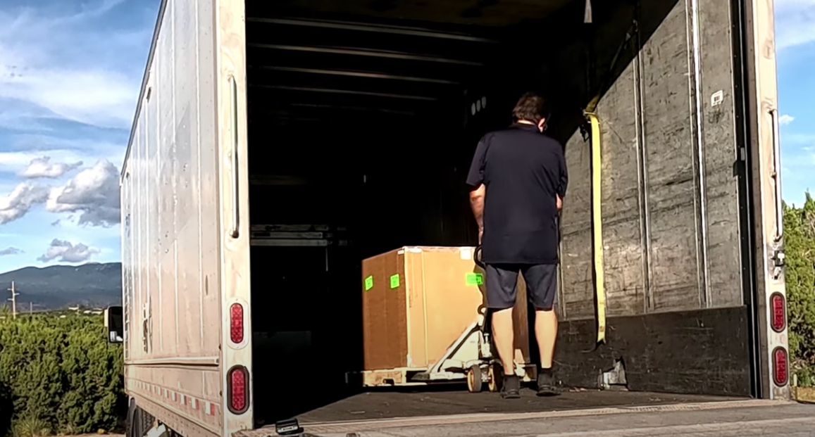 Load video: A customer takes delivery of a new trike from Hostel Shoppe. Watch the complete video on YouTube.