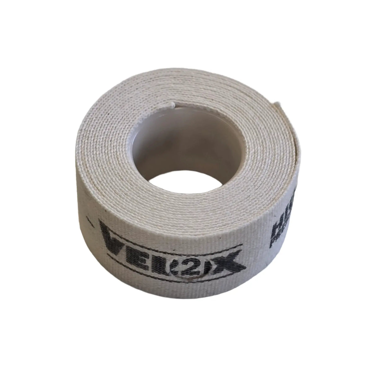 Angled view of the Velox Single Roll Cloth Rim Tape in 22mm width off-white tape against a white background.