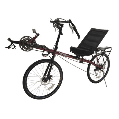 Angled non-drive side view of the Volae Used Expedition Pro Candy Red Recumbent Bicycle XL against a white background.