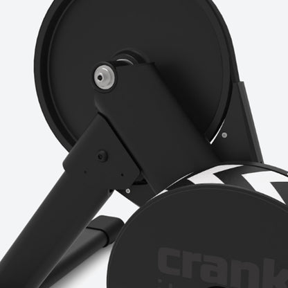 Closeup back view of a Wahoo KICKR Core 2 black bike trainer against a white background.