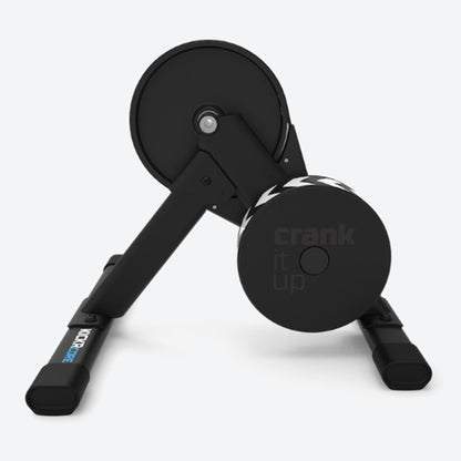 Side view of a Wahoo KICKR Core 2 black bike trainer against a white background.