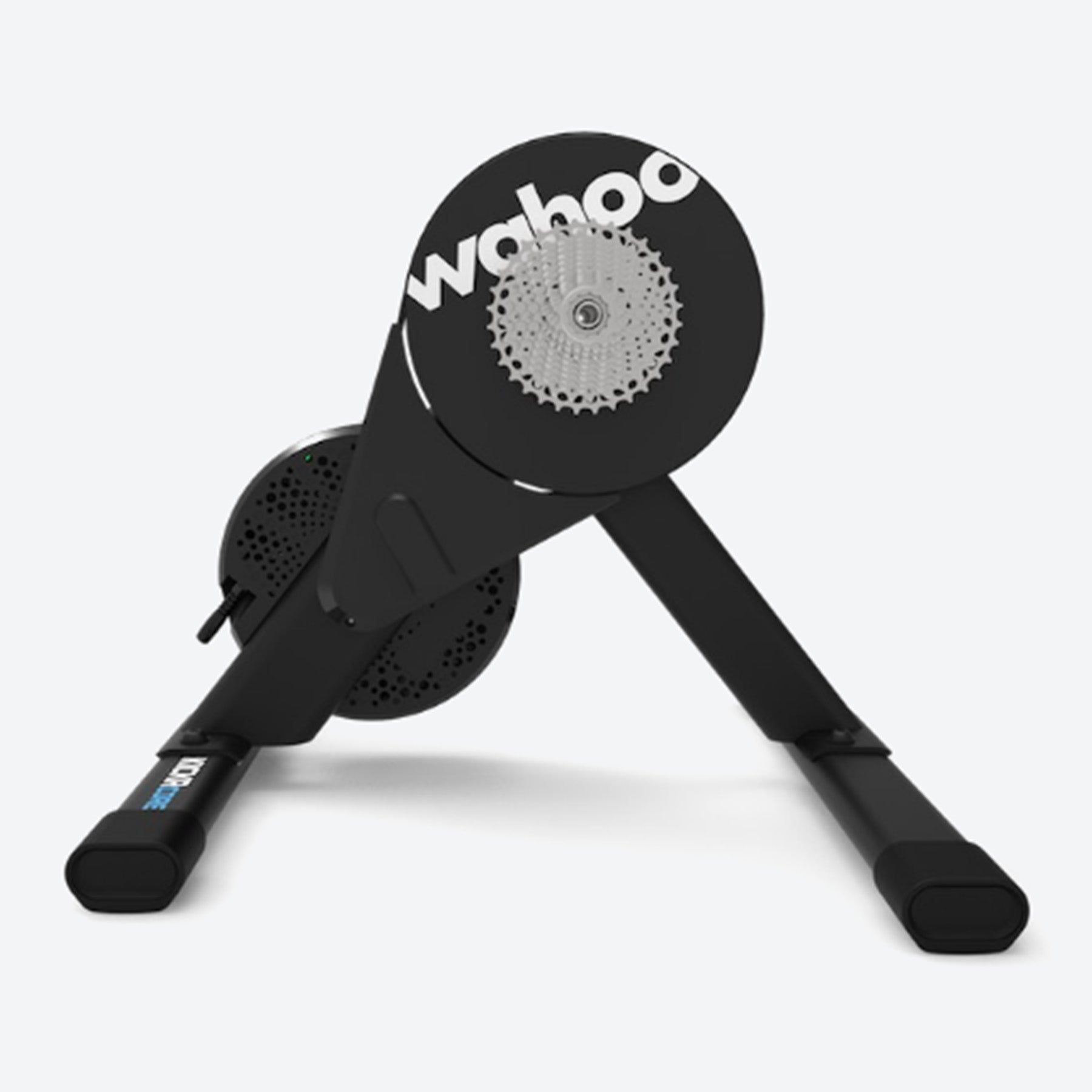 Side view with cassette of a Wahoo KICKR Core 2 black bike trainer against a white background.