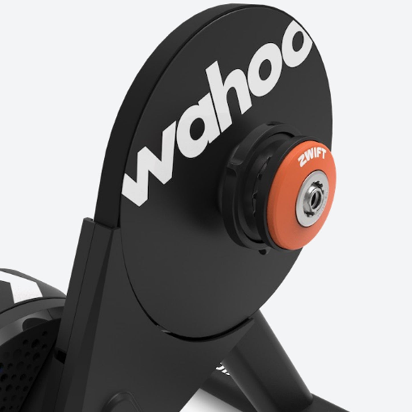 Closeup view of Wahoo KICKR Core 2 Smart Trainer with Zwift Cog and Click indoor cycling trainer against a white background.