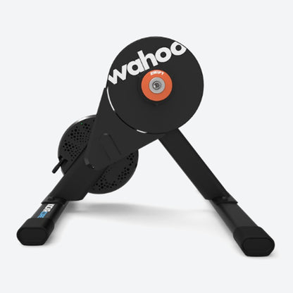 Side view of Wahoo KICKR Core 2 Smart Trainer with Zwift Cog and Click indoor cycling trainer against a white background.