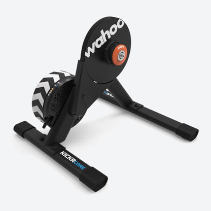 Angled view of Wahoo KICKR Core 2 Smart Trainer with Zwift Cog and Click indoor cycling trainer against a white background.