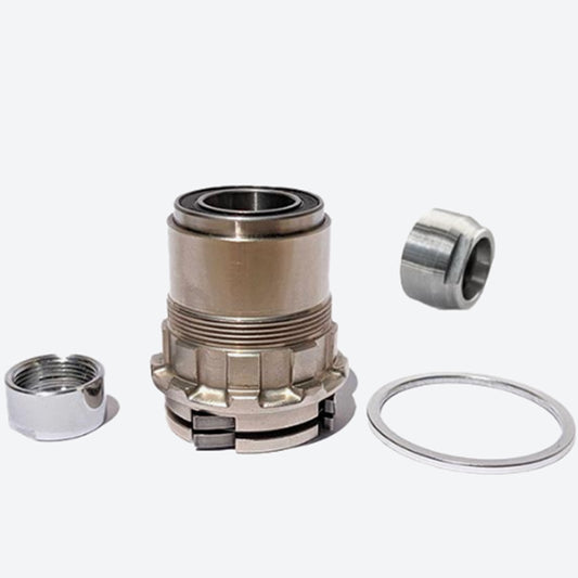 Wahoo XDR/XD Freehub with spacer and nuts pictured against a white background.