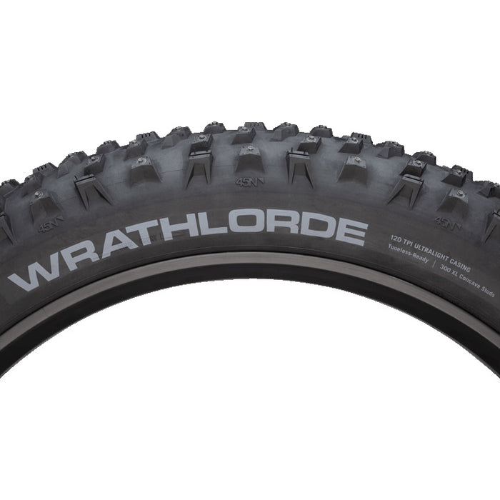 45NRTH Wrathlorde Fat Tire, studio photo front quarter view, studio view of tire with logo, shown mounted on rim