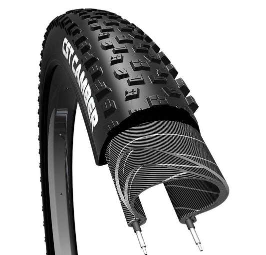 Black mountain bike tire with prominent knobby tread pattern, showing the sidewall and tread direction.