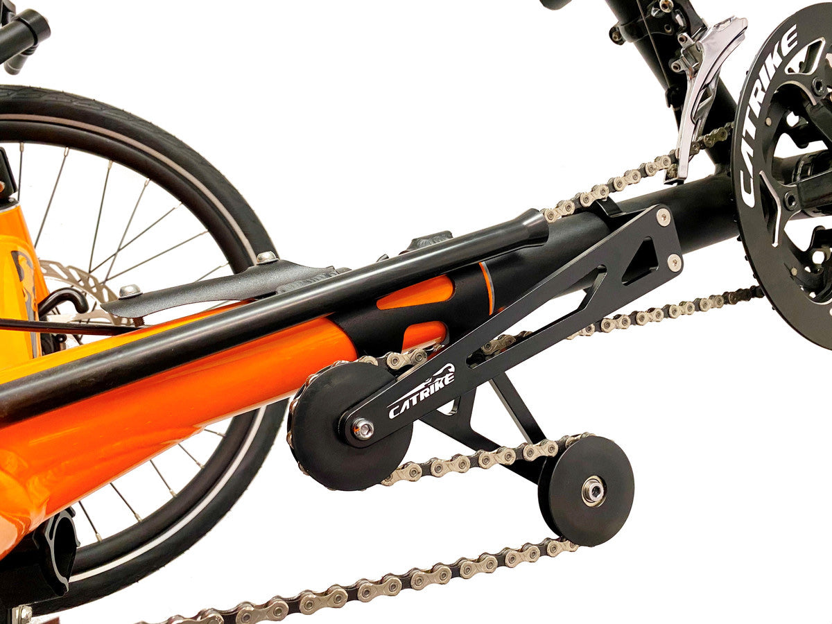 Catrike Chain Tensioner on an orange catrike recumbent