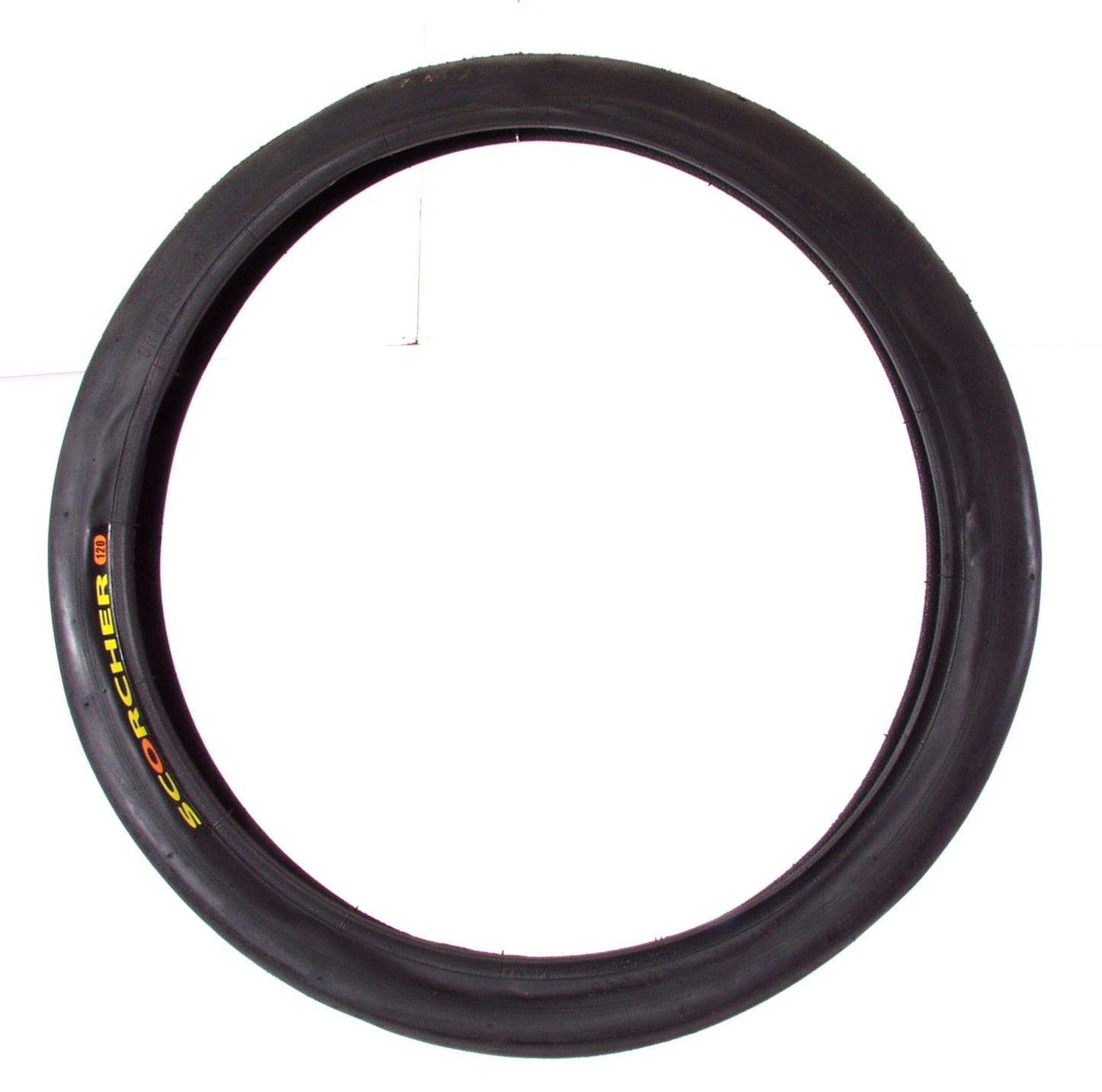 A black bicycle tire with the brand name Greenspeed visible on the sidewall.