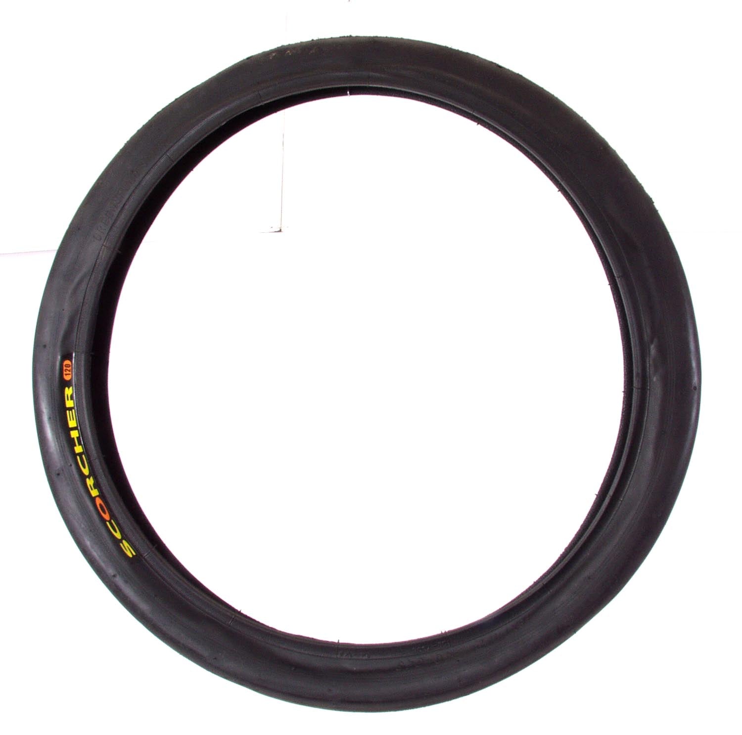 A black bicycle tire with the brand name Greenspeed visible on the sidewall.