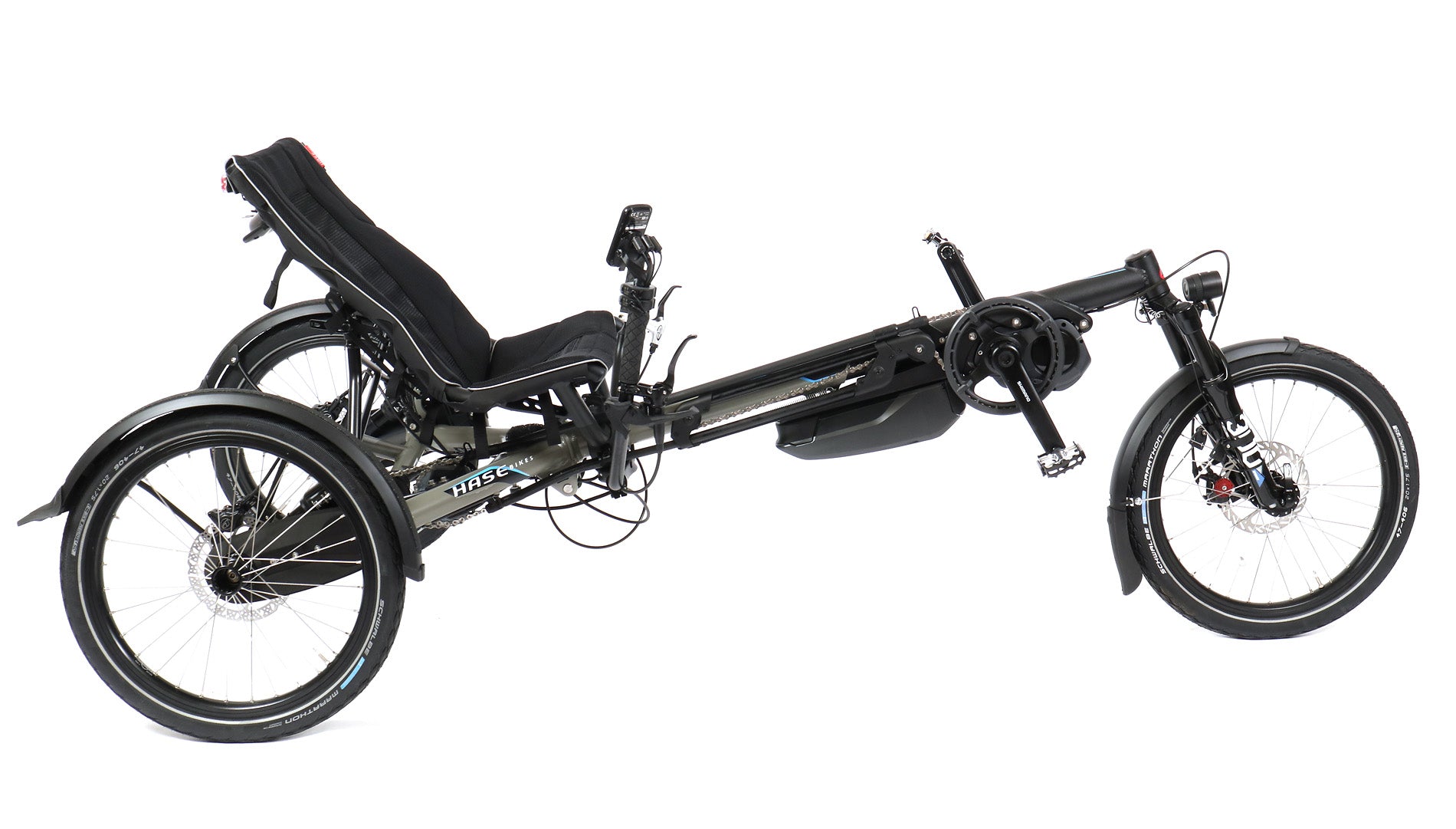 A Hase Kettwiesel Evo Shimano Steps 6100 electric recumbent trike with black coloring and large wheels, equipped with a Shimano motor and suspension system.
