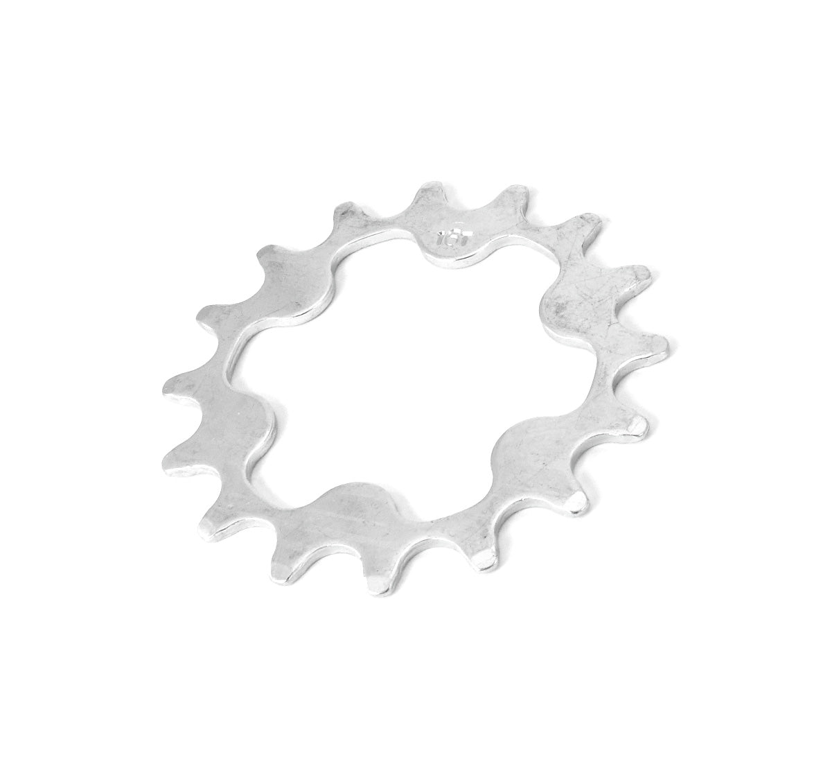 A silver-colored metal sprocket for a Hase trike with rear suspension.