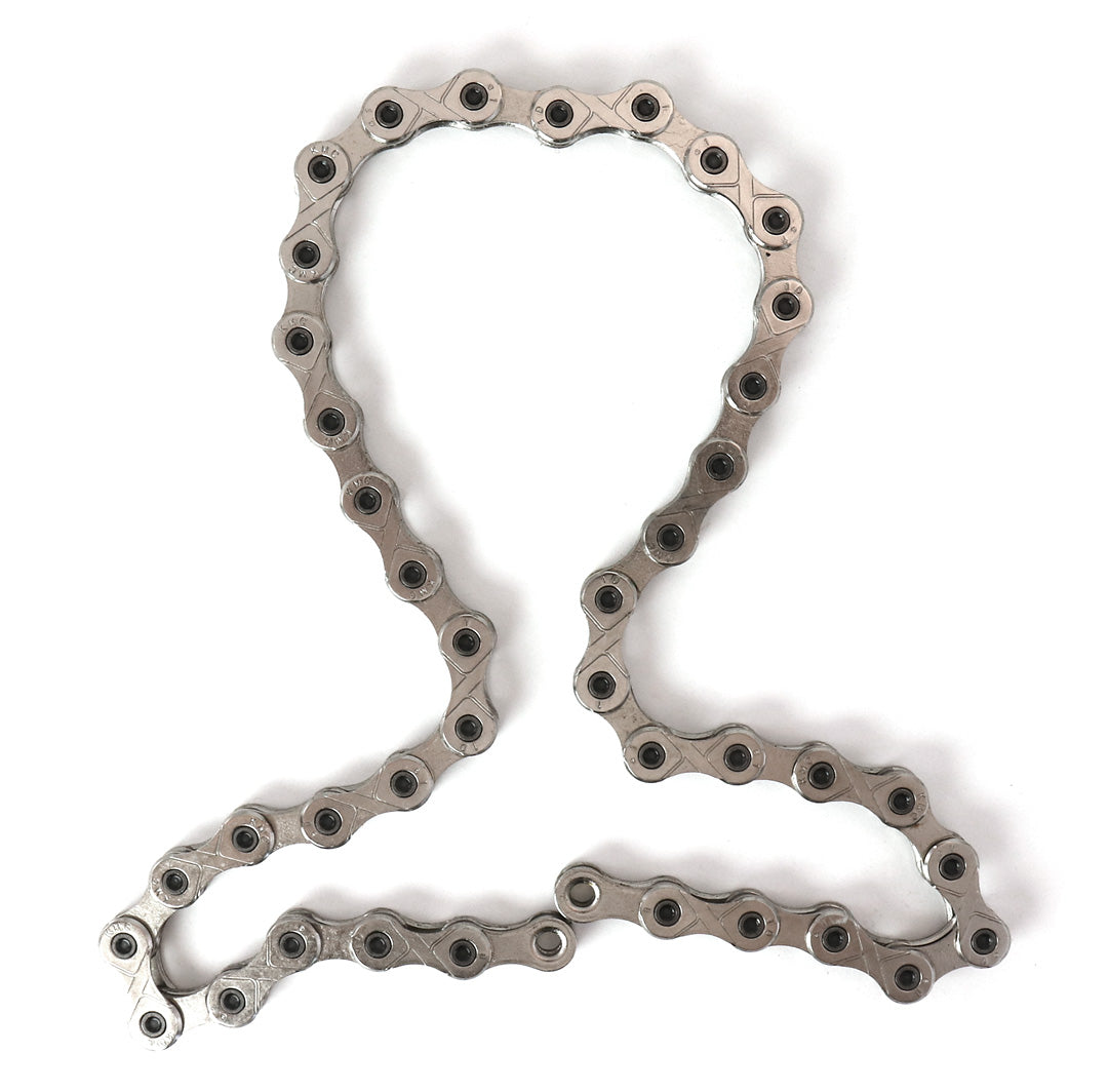 A silver 20-link bicycle chain for Hase Kettwiesel models with Suspension.