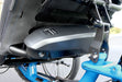 View of battery mounted onto an ICE Battery Seat mount on back of seat frame of a blue recumbent trike.