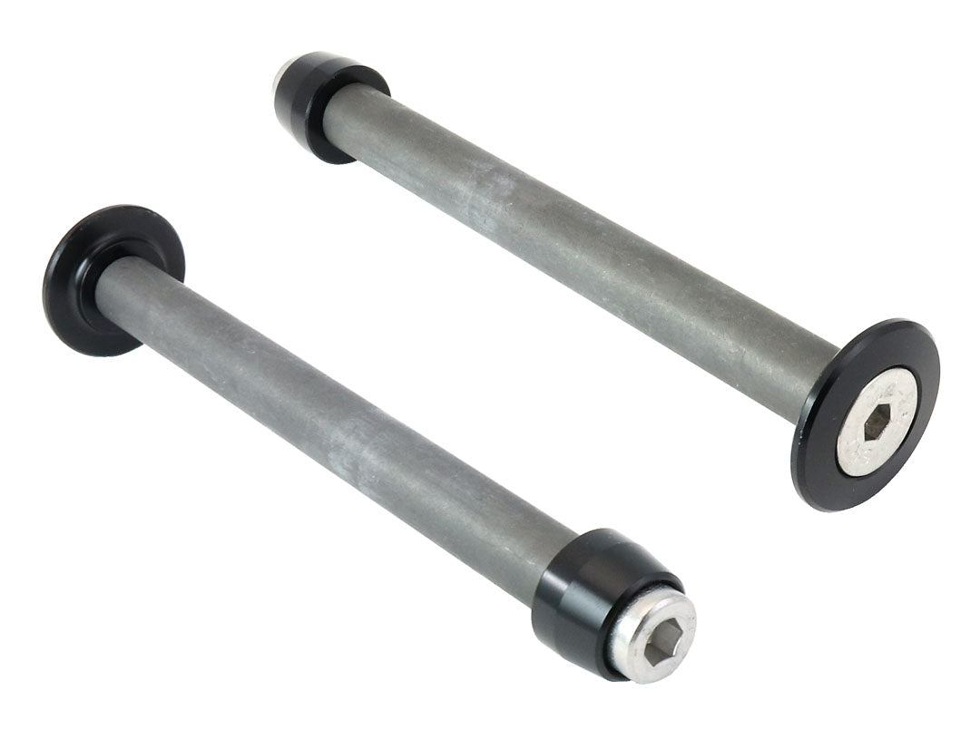 ICE Drum Brake Axles showing two of them, opposite ends. on a white background