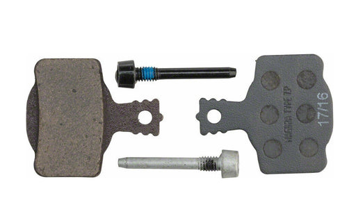 Studio image of Magura 7P Performance Disc Brake pads. Left pad has the brake surface showing, the right pad has the back side of the brake showing.  There is a black bolt in the top middle of the image and a silver bolt in the bottom middle of the image. 