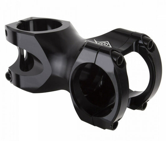 Black CNC stem for bicycles, with a polished finish and a 4-bolt front loading one-piece faceplate design.
