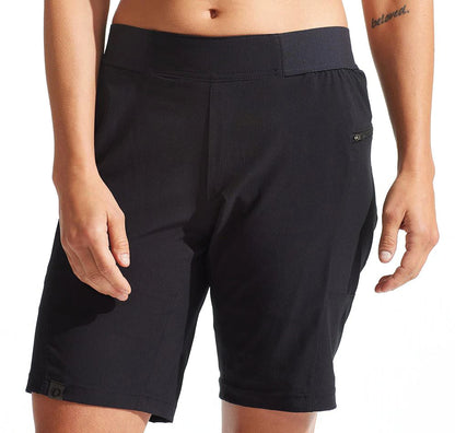 A pair of black Pearl Izumi women's cycling shorts with a wide stretch waistband and hand pockets.