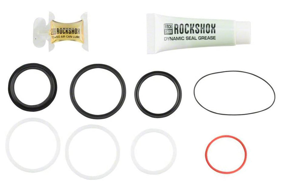 Service kit for RockShox suspension systems, including various small parts such as seals and rings.