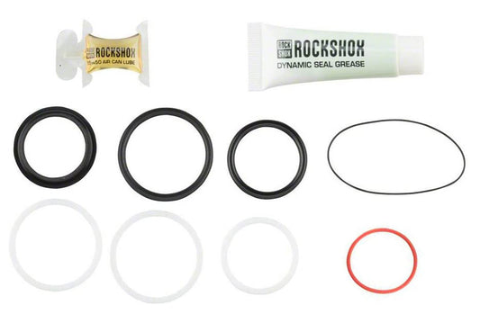 Service kit for RockShox suspension systems, including various small parts such as seals and rings.