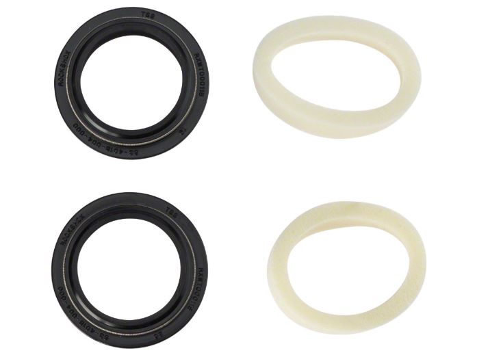 An image showing three different components of a RockShox dust seal kit, including a black foam ring and two black o-rings.