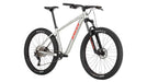 Right profile studio image of a Salsa Rangefinder mountain bike with a silver frame, orange Salsa logo on down tube and black and orange front fork.