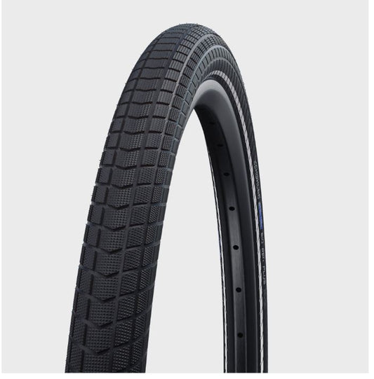 A black Schwalbe Big Ben Plus bicycle tire with a wired bead and GreenGuard sealant, designed for 26-inch wheels.