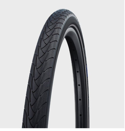 A black bicycle tire with a herringbone pattern tread, marked with the Schwalbe brand logo at the sidewall.