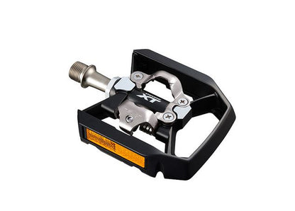 Shimano Deore XT PD-T8000 Platform/Clipless Pedals on a white background showing the top of the pedal