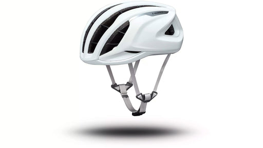 Studio image of White Specialized S-Works Prevail 3 helmet.  White strap with gray and black buckle are suspended below the helmet which appears to be floating mid-air