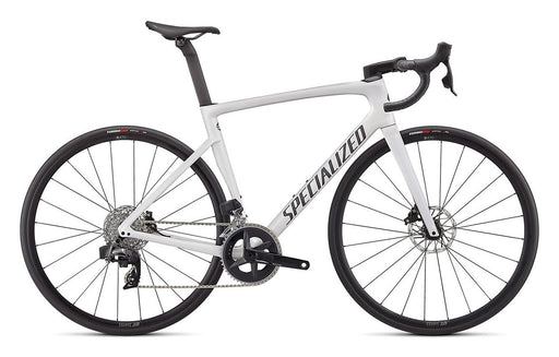 Specialized Tarmac SL7 Road Bike with white frame and black lettering, black crankset, wheels, handlebars, seatpost and saddle. Right profile view