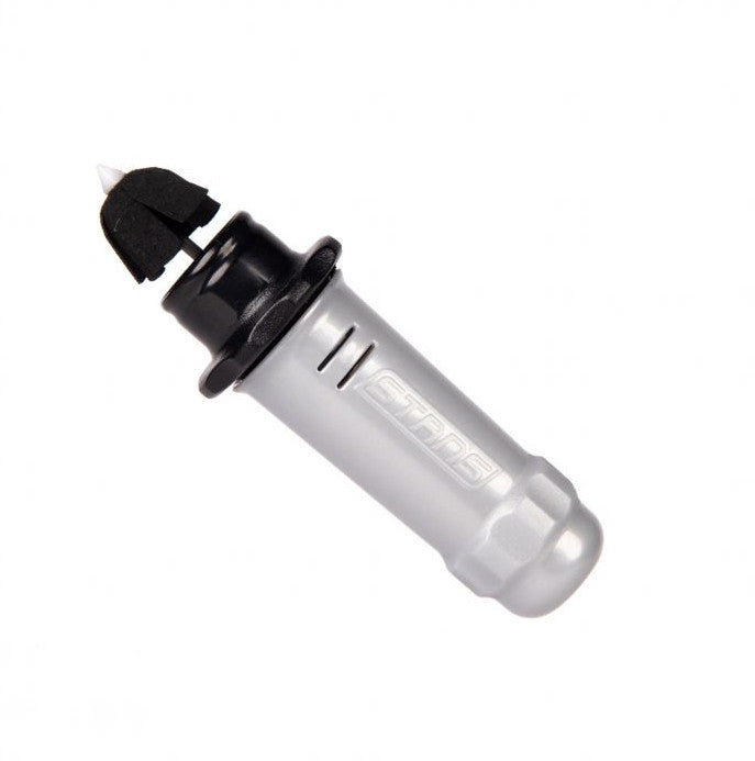 A silver and black Stan's No Tubes Dart Tool for bicycle tire repair, with a cylindrical body and a plastic tip.