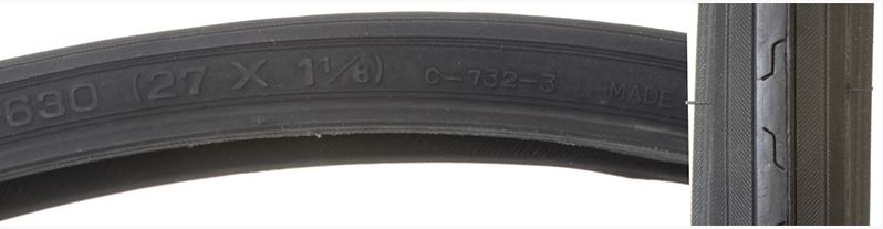 A black bicycle tire with grooved tread and directional siping, labeled with '630' and '27x1-1/8'.