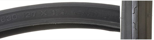 A black bicycle tire with grooved tread and directional siping, labeled with '630' and '27x1-1/8'.