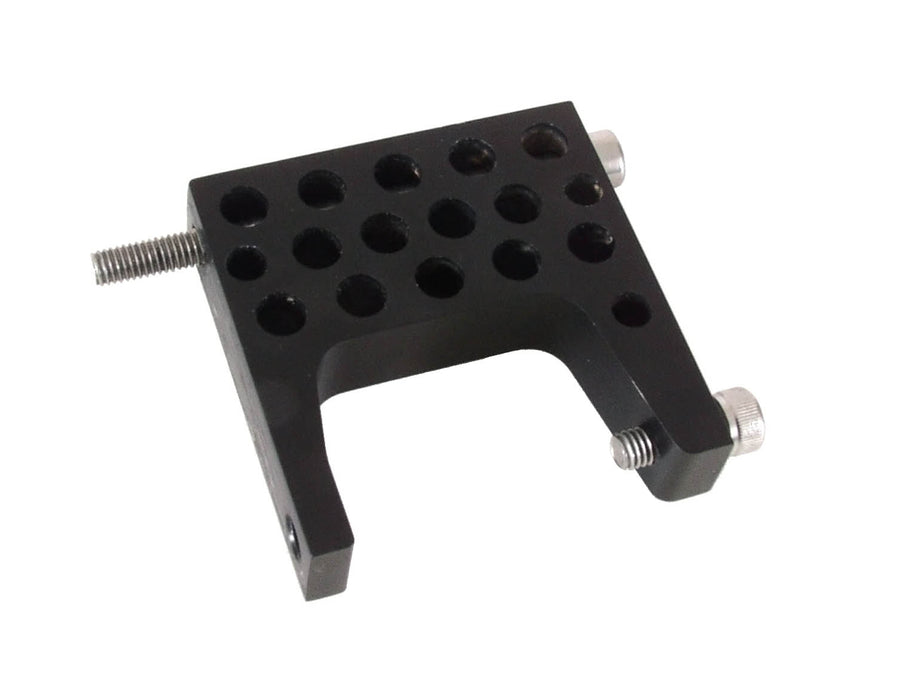 Top view of black T-cycle battery mount plate with 16 holes to allow for different configurations