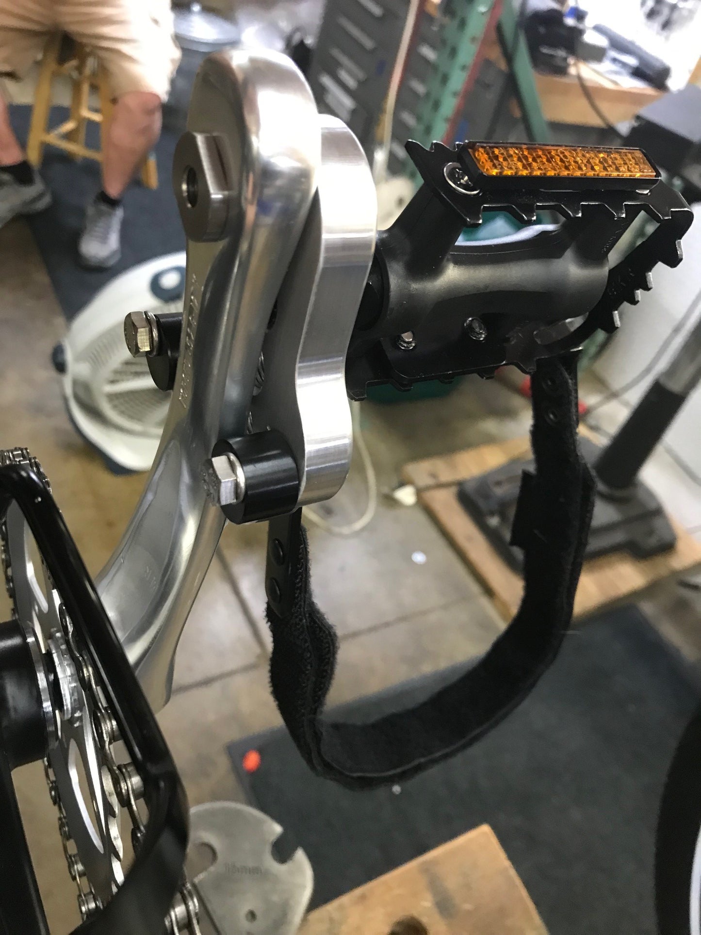 Angled view of the CJ Ackley Machine Company Crank Arm Shorteners Individual mounted on crank arm.