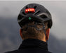 Lazer Universal Rechargeable LED Taillight mounted to a biker's helmet back view