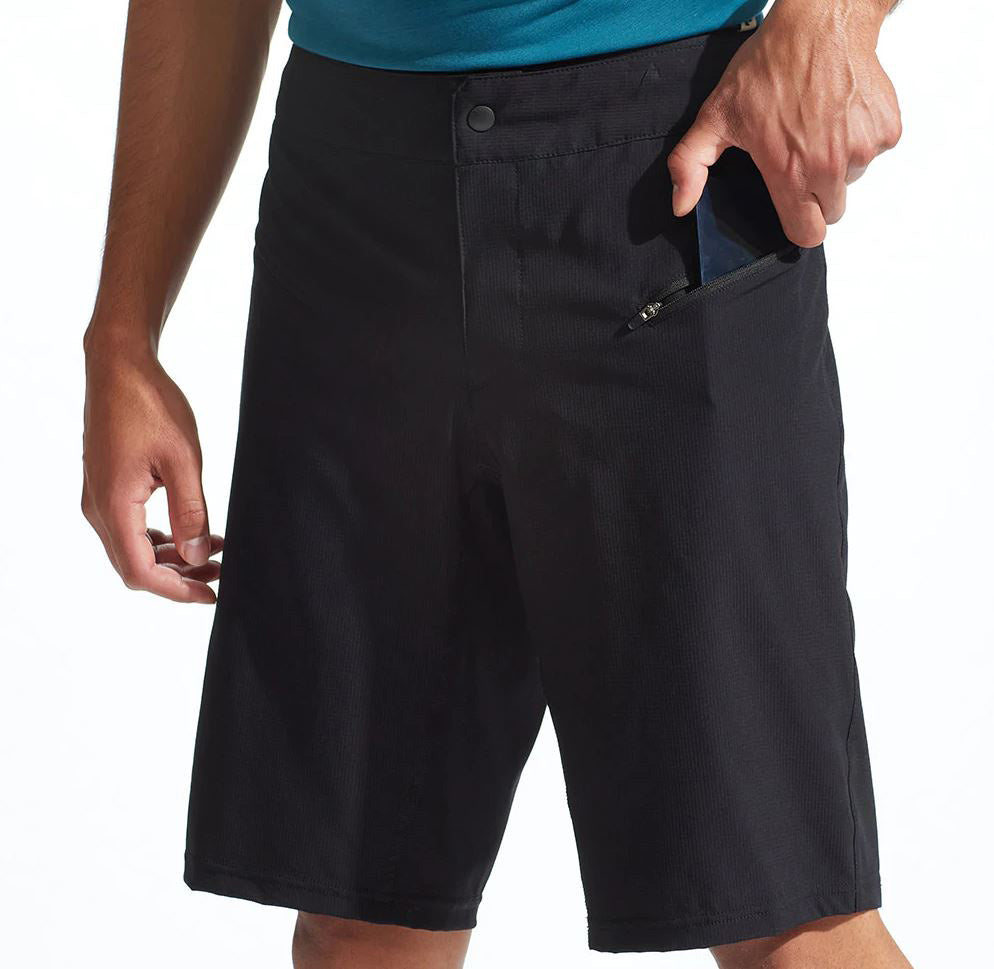 Angled view of the Pearl Izumi Mens Canyon Short with Liner in black against a white background.
