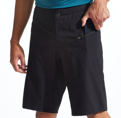 Angled view of the Pearl Izumi Mens Canyon Short with Liner in black against a white background.