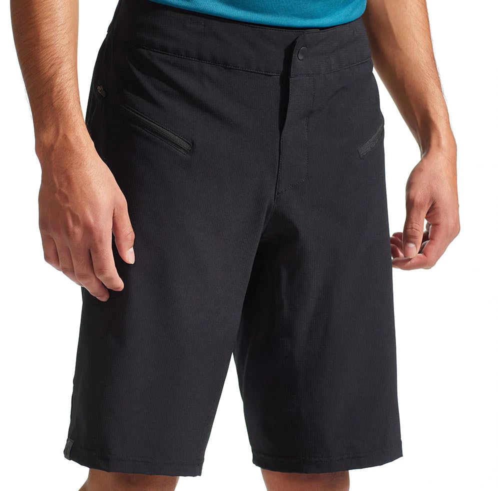 The Pearl Izumi Mens Canyon Short with Liner in black on a model against a white background.